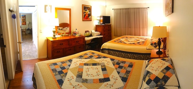 bedroom featuring hardwood / wood-style flooring