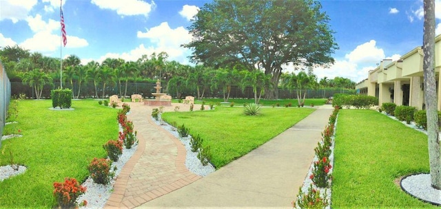 view of home's community featuring a yard