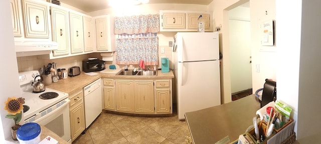 kitchen with backsplash, sink, light tile patterned floors, and white appliances