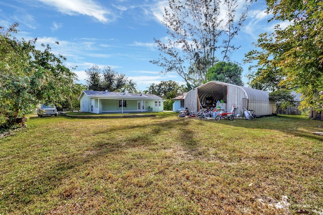 view of yard with a carport