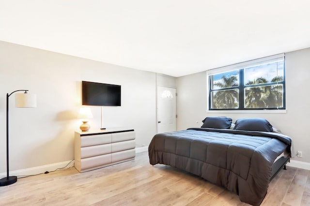 bedroom featuring light wood-type flooring