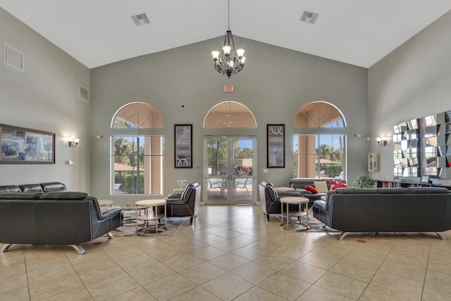 kitchen with light stone countertops, sink, light tile patterned floors, and white appliances