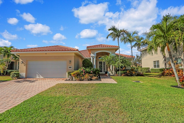 entrance to property with a yard