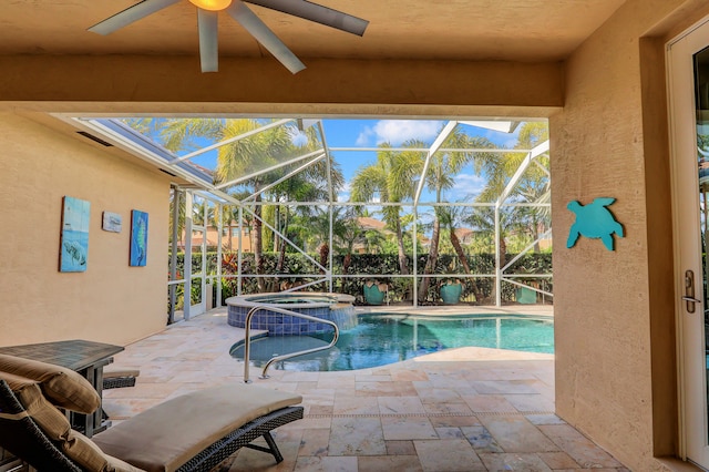 view of pool featuring an in ground hot tub, a lanai, and pool water feature