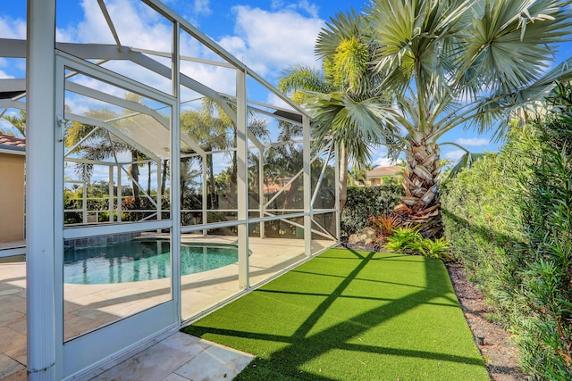 view of yard with a lanai