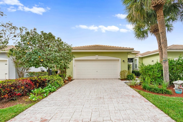 view of front of home with a garage