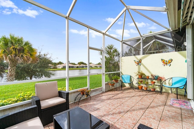 unfurnished sunroom with a water view