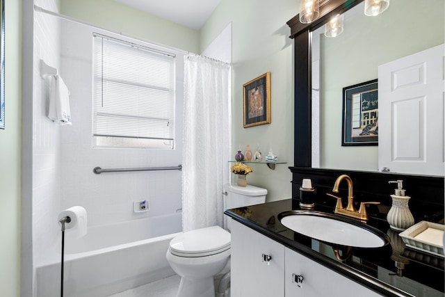 full bathroom with toilet, vanity, and shower / tub combo with curtain