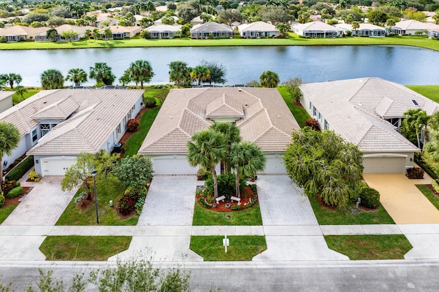 drone / aerial view with a water view