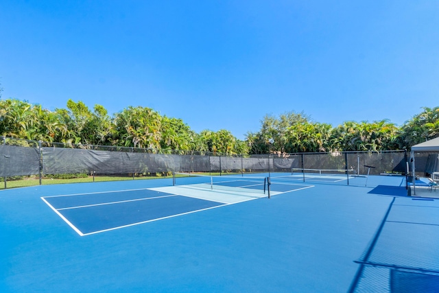 view of tennis court with basketball court