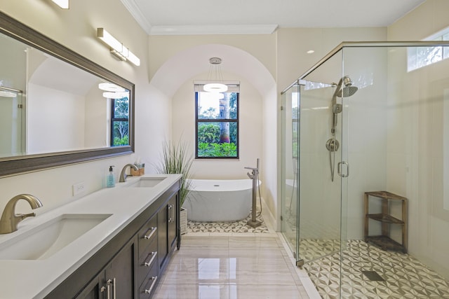 bathroom with shower with separate bathtub, vanity, and ornamental molding