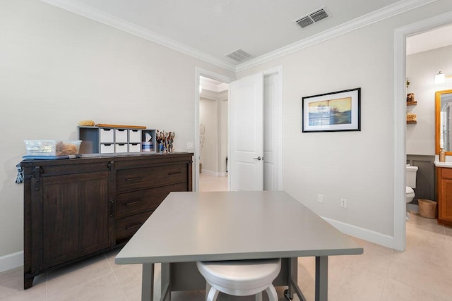 tiled dining area with crown molding