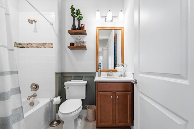 full bathroom featuring vanity, toilet, and shower / bathtub combination with curtain