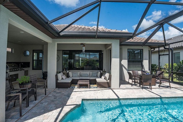 view of pool with outdoor lounge area, a patio, and glass enclosure