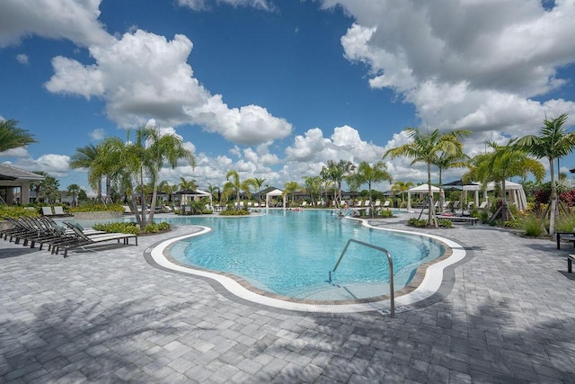 view of swimming pool with a patio area