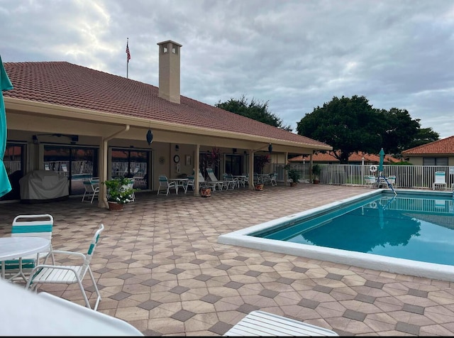 view of pool featuring a patio