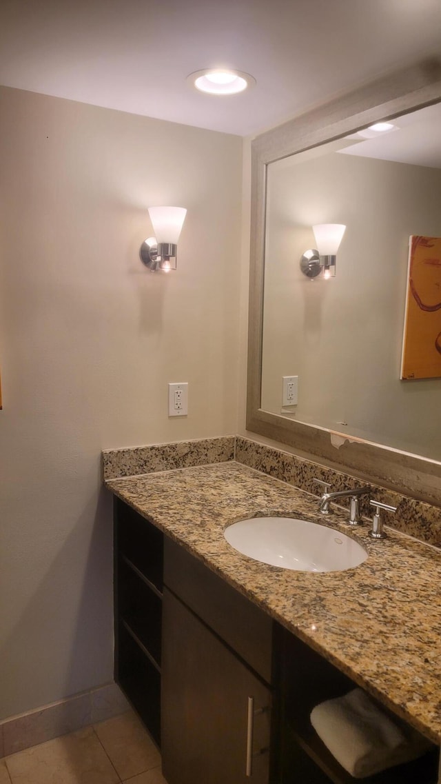 bathroom with vanity and tile patterned flooring