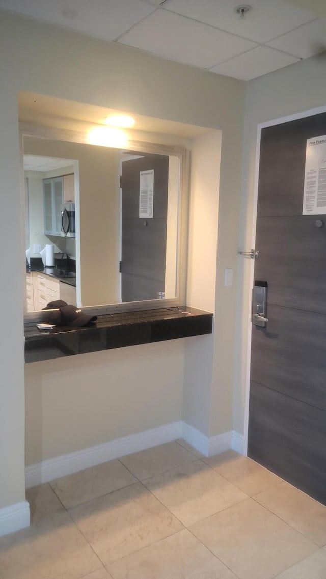 kitchen with light tile patterned floors