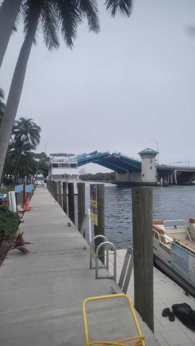 view of dock with a water view