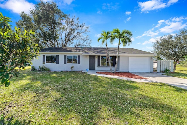 single story home featuring a front lawn and a garage