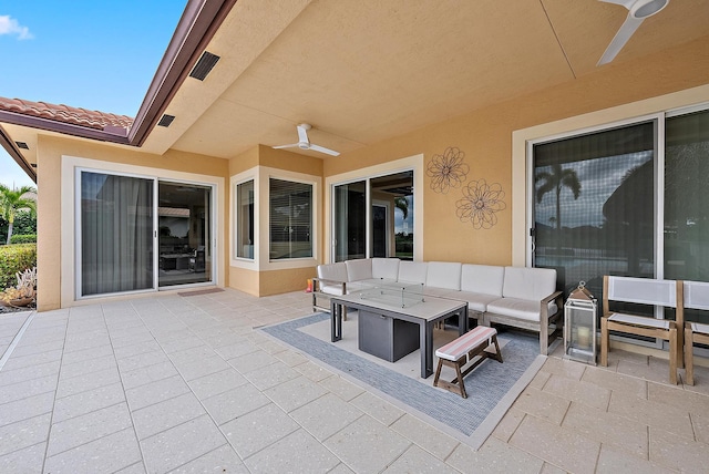 view of patio / terrace featuring an outdoor living space and ceiling fan