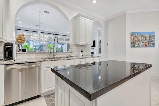 kitchen with white cabinetry, dishwasher, a center island, and sink