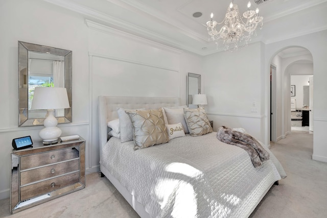 bedroom with light carpet, a chandelier, and crown molding