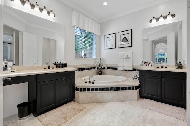 bathroom featuring vanity, tiled bath, tile patterned floors, and ornamental molding