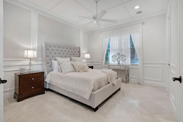 bedroom with ceiling fan and crown molding