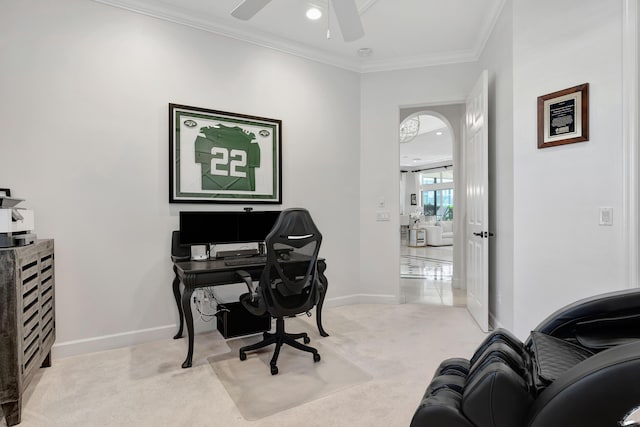 carpeted office with ceiling fan and ornamental molding