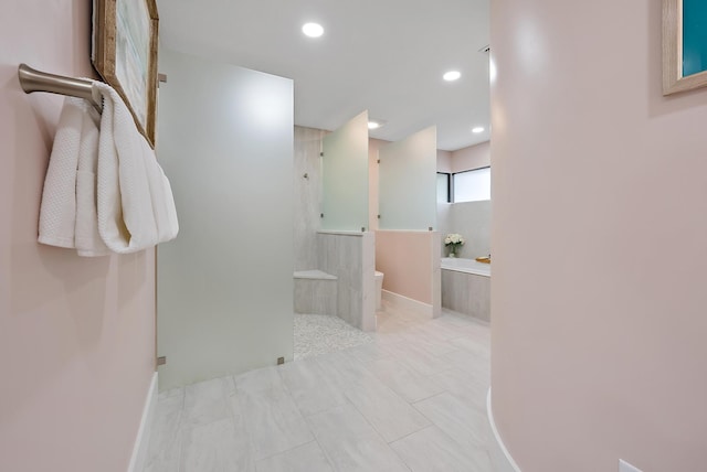 bathroom with tile patterned floors, separate shower and tub, and toilet