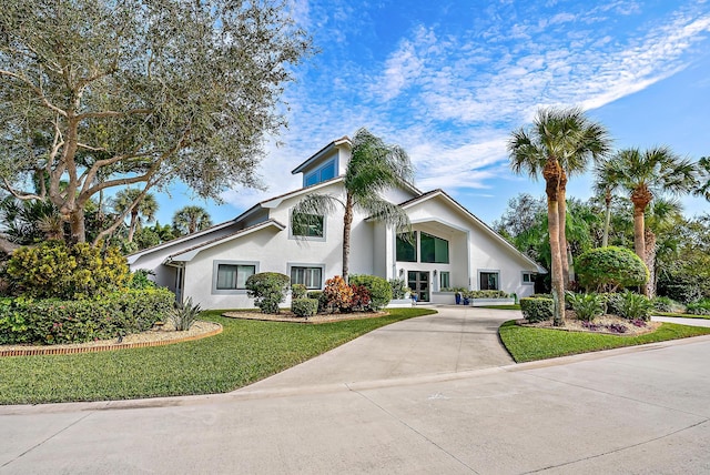 view of front of property with a front lawn