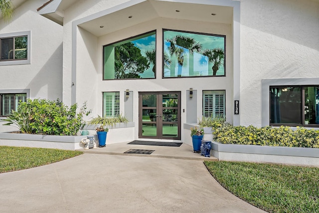 property entrance featuring french doors