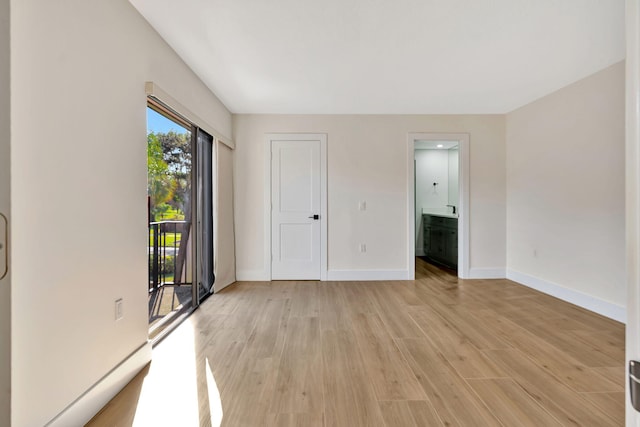 empty room featuring light hardwood / wood-style floors