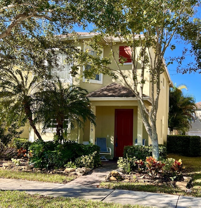 view of front of property featuring stucco siding