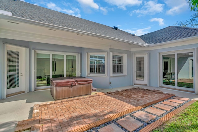 view of patio with a hot tub