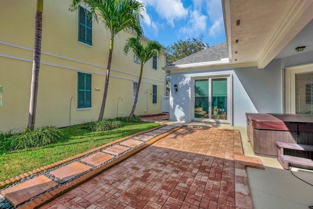 view of patio with a hot tub