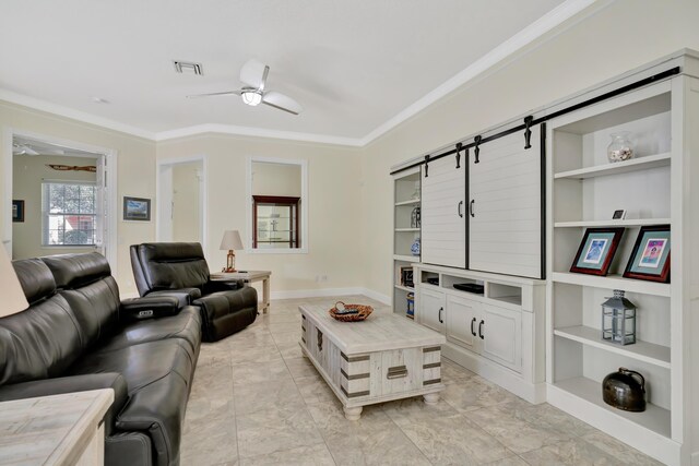 living room featuring ceiling fan and ornamental molding