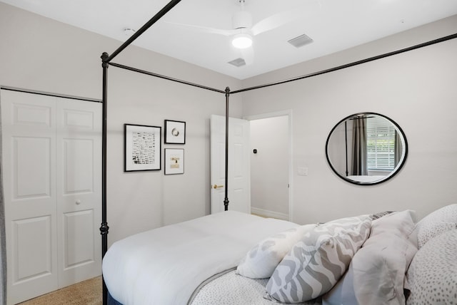 bedroom featuring ceiling fan and a closet