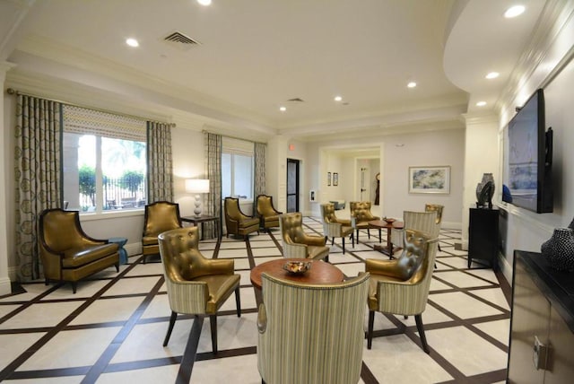 living area featuring a tray ceiling