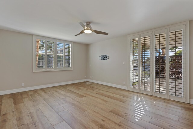 bathroom featuring hardwood / wood-style flooring and toilet