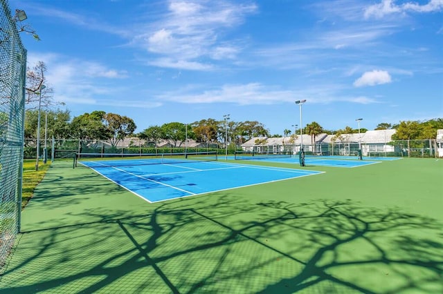 view of tennis court with basketball court