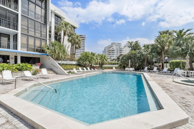 view of pool featuring a patio area