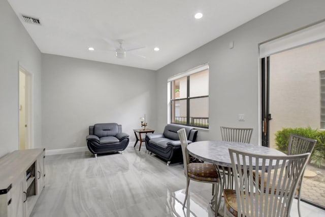 living room featuring ceiling fan