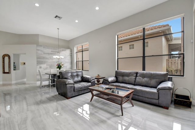 living room featuring a chandelier