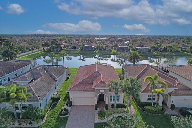 drone / aerial view with a water view