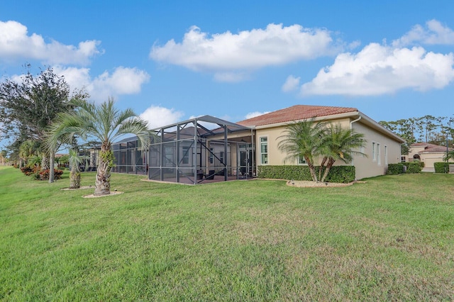 view of yard featuring glass enclosure