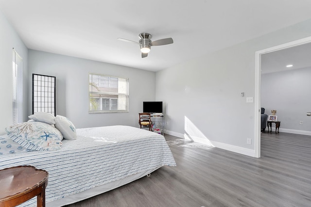 bedroom featuring ceiling fan and hardwood / wood-style flooring