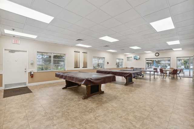 recreation room with pool table and a drop ceiling