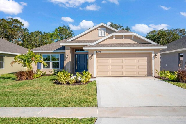 view of front of home with a front yard, a garage, and central air condition unit